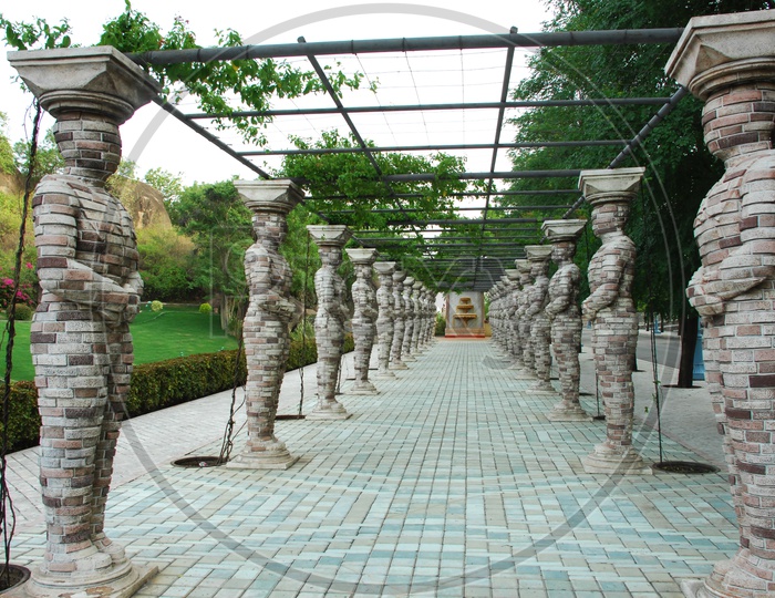 Human shaped pillars support for the creeper plant