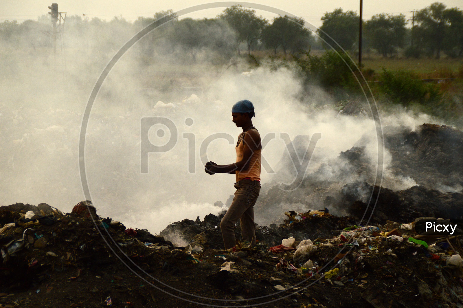 Image of Unidentified Rag Pickers Collecting Recyclable Materials From