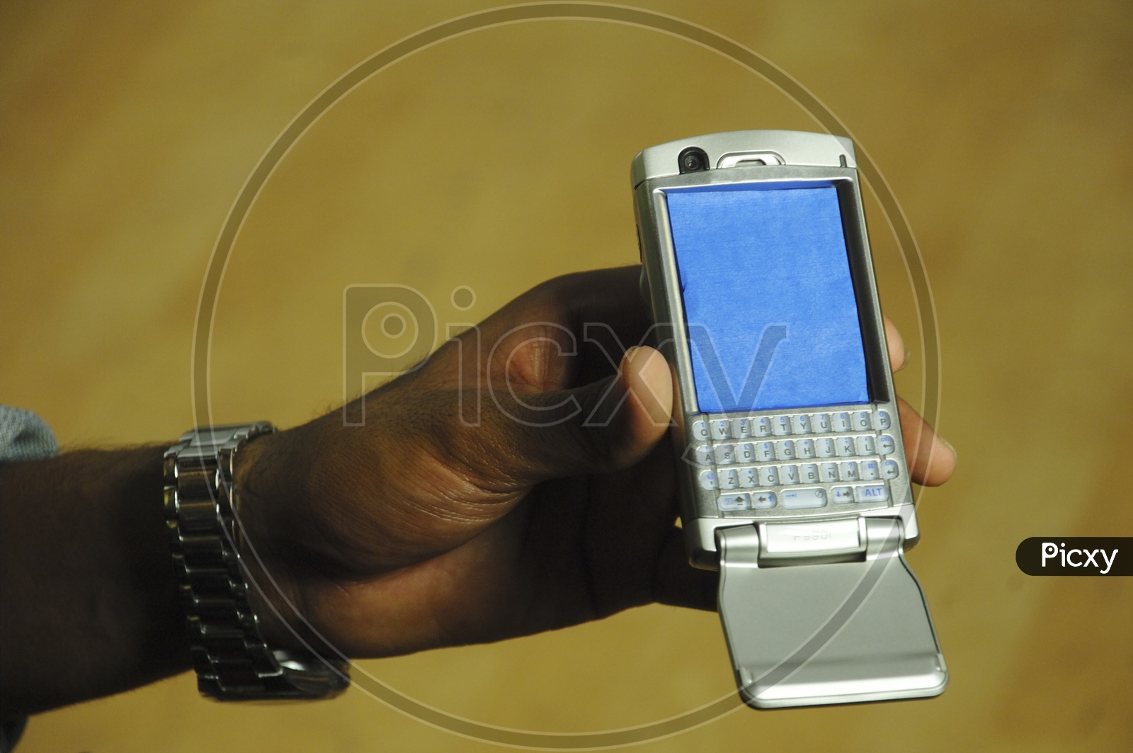 Man holding a mobile phone in his hand