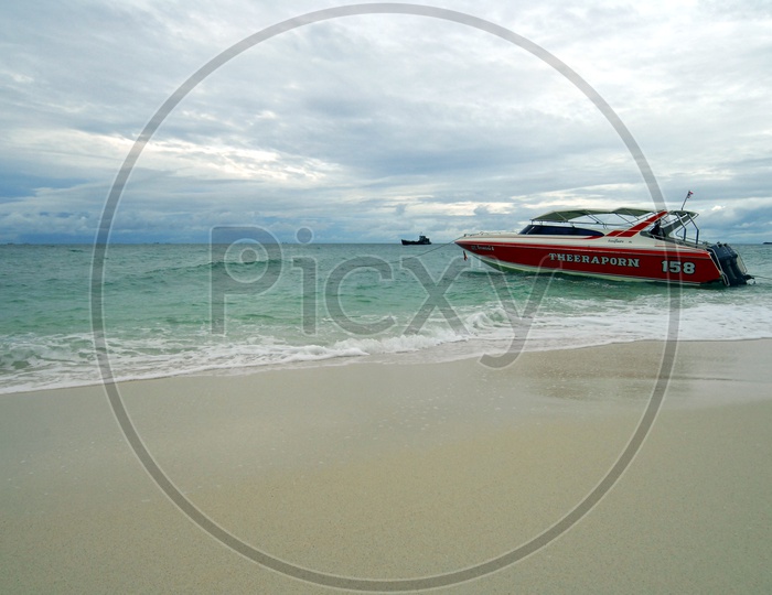 Speed Boats Anchored in Beach waters