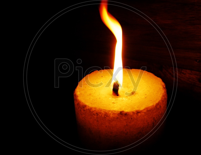 Wax Candle Lighted In  Dark
