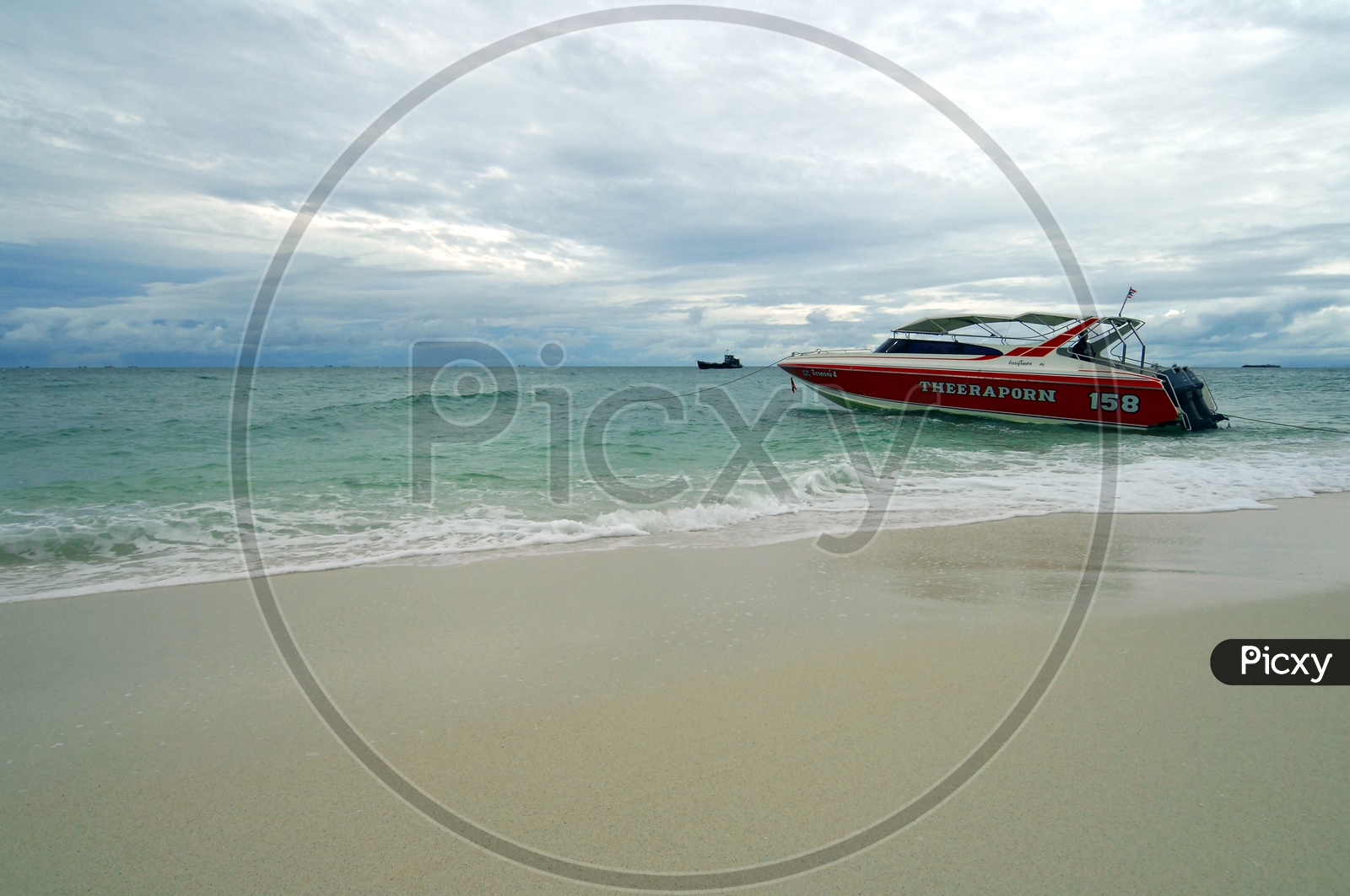 Speed Boats Anchored in Beach waters