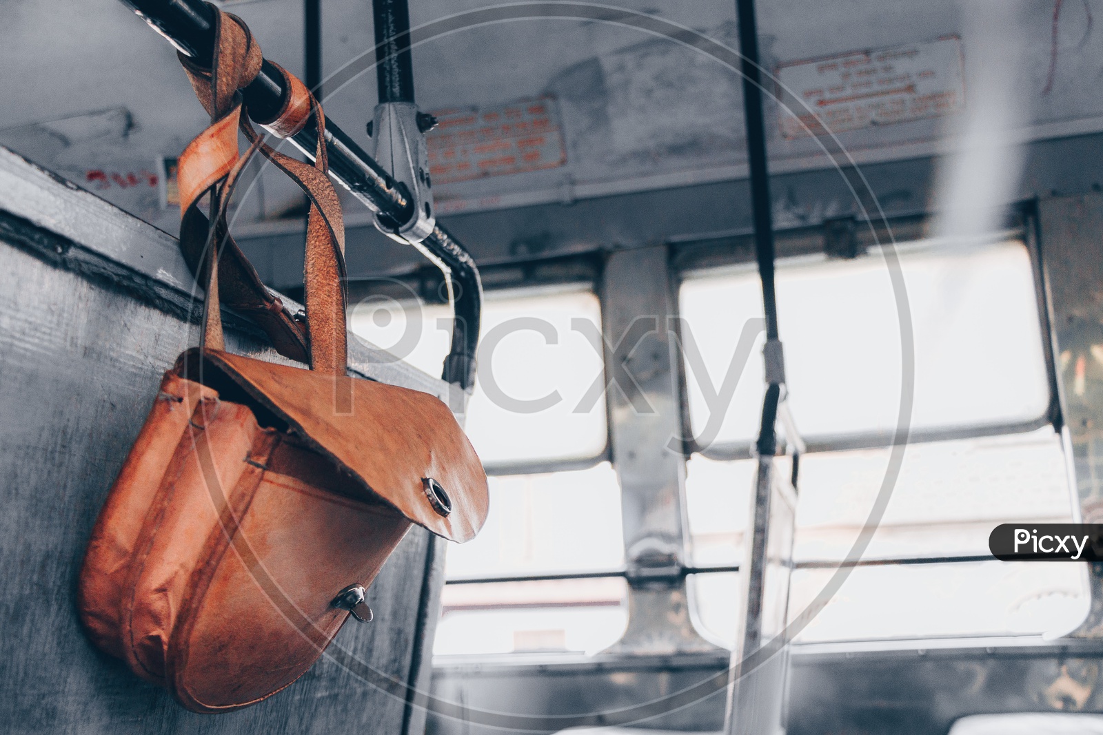 Image of A purse of a city bus conductor in Pune City BusUI542974Picxy