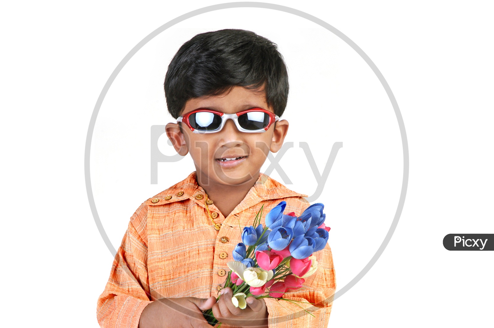 Indian boy wearing sunglasses holding flowers