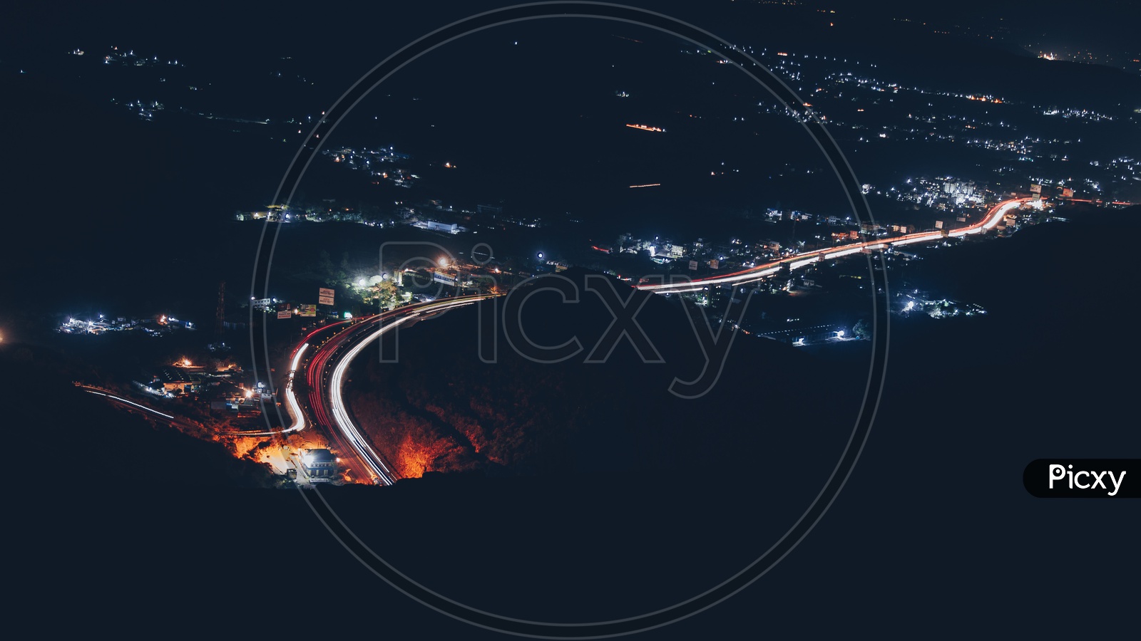 view of Pune city at night from above the Katraj Tunnel and was clicked during famous, popular trek, K2S (Katraj-to-Sinhagad).