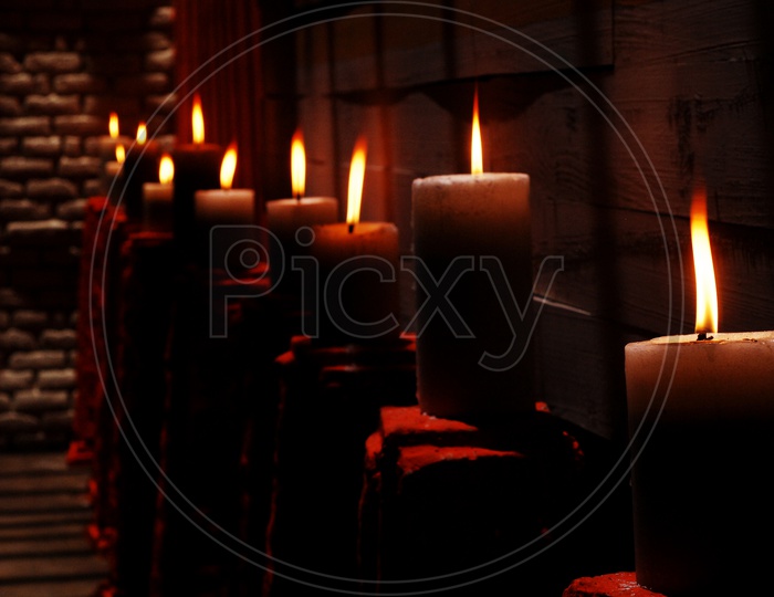 Wax Candle Lighted In Dark