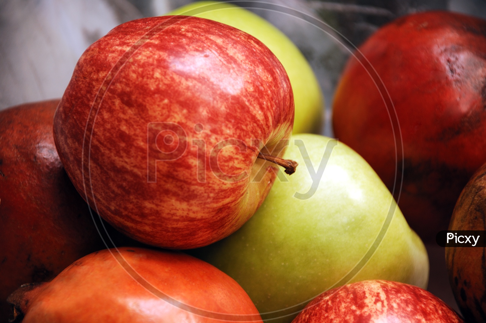 Apple among the fruits