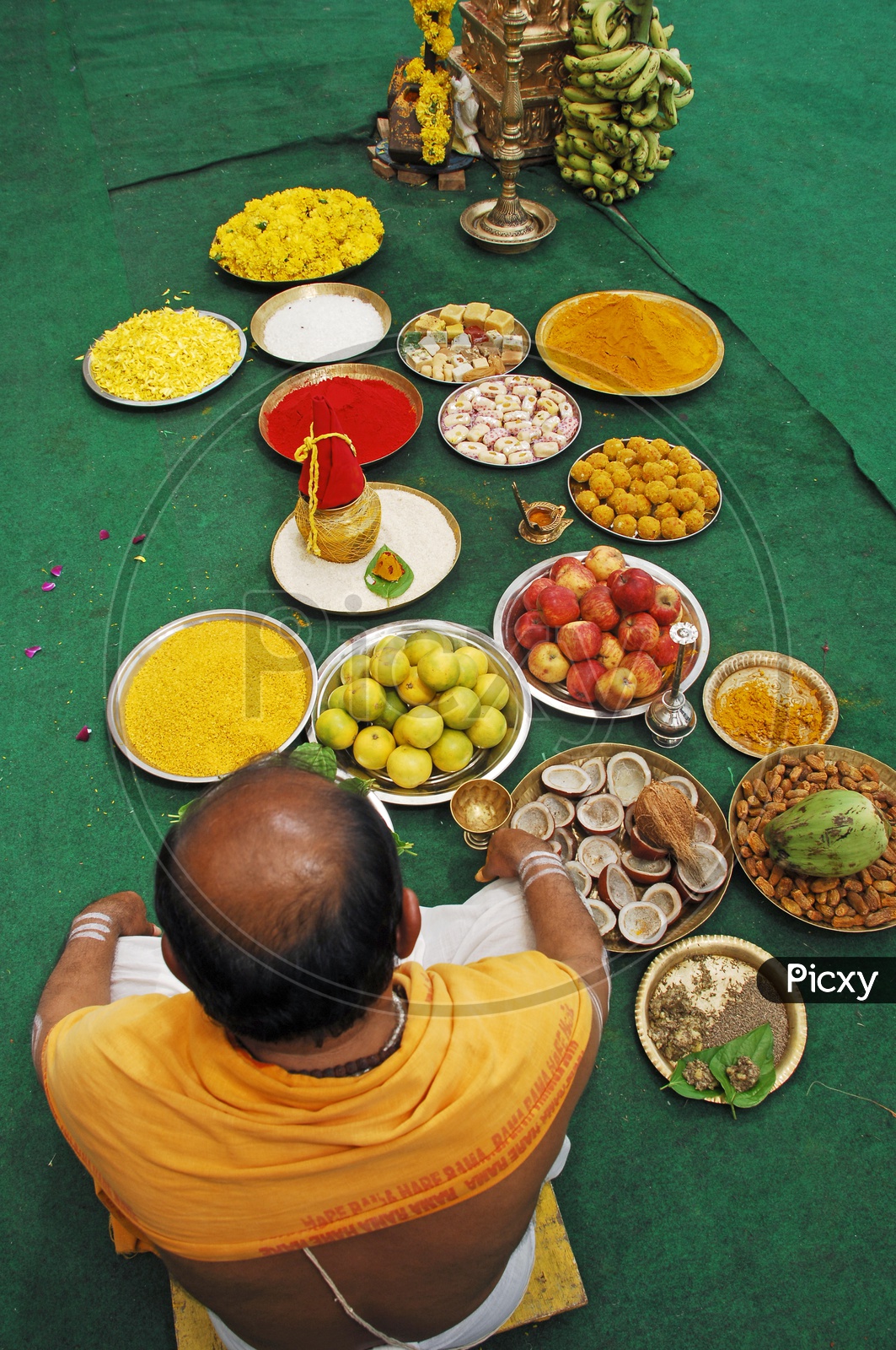 Priest Performing Pooja In a Event With Pooja plates Present