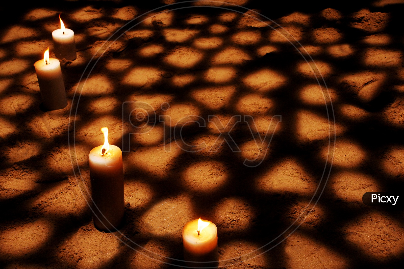 Wax Candle Lighted In a Dark Room