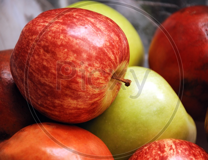 Apple among the fruits