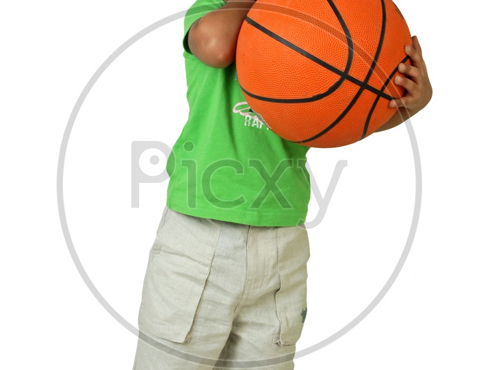 Indian boy holding a Basketball