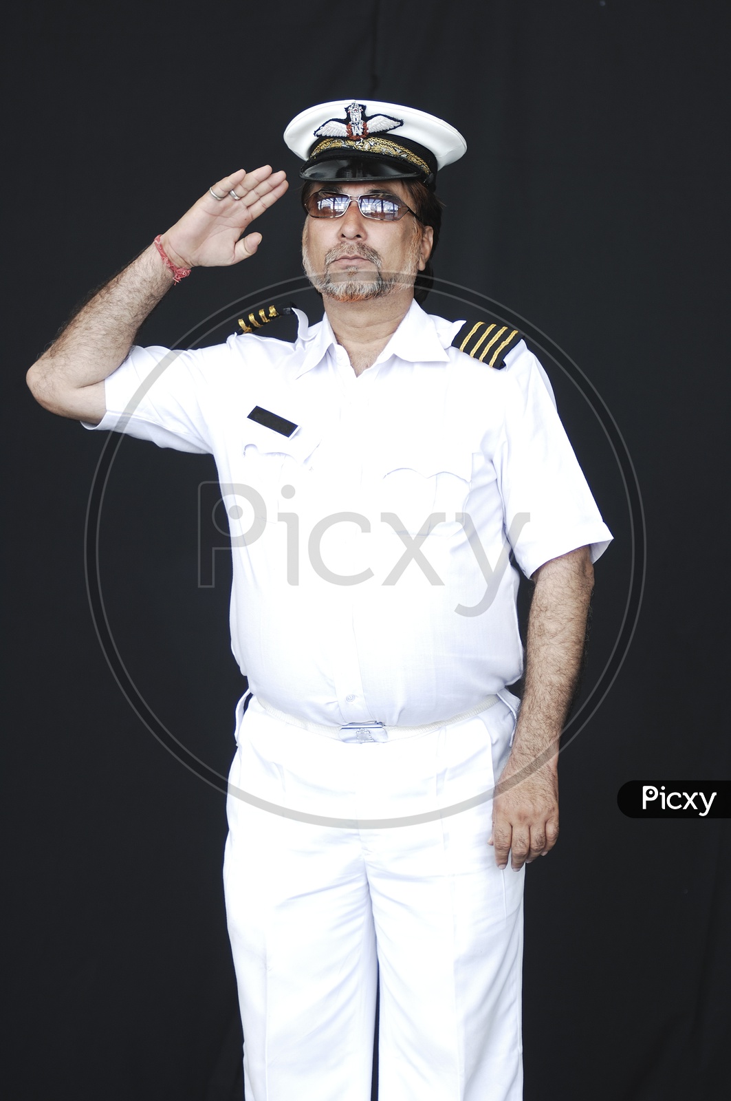 Man dressed up in a Navy Costume