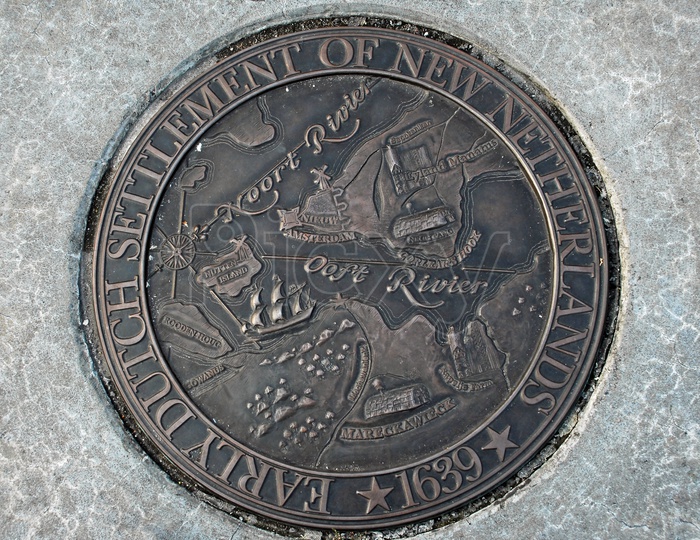 Representation of Early Dutch settlement of New Netherlands, 1639 on a metal