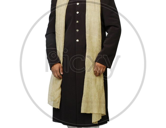 A male model posing with a Indian traditional wear - sherwani