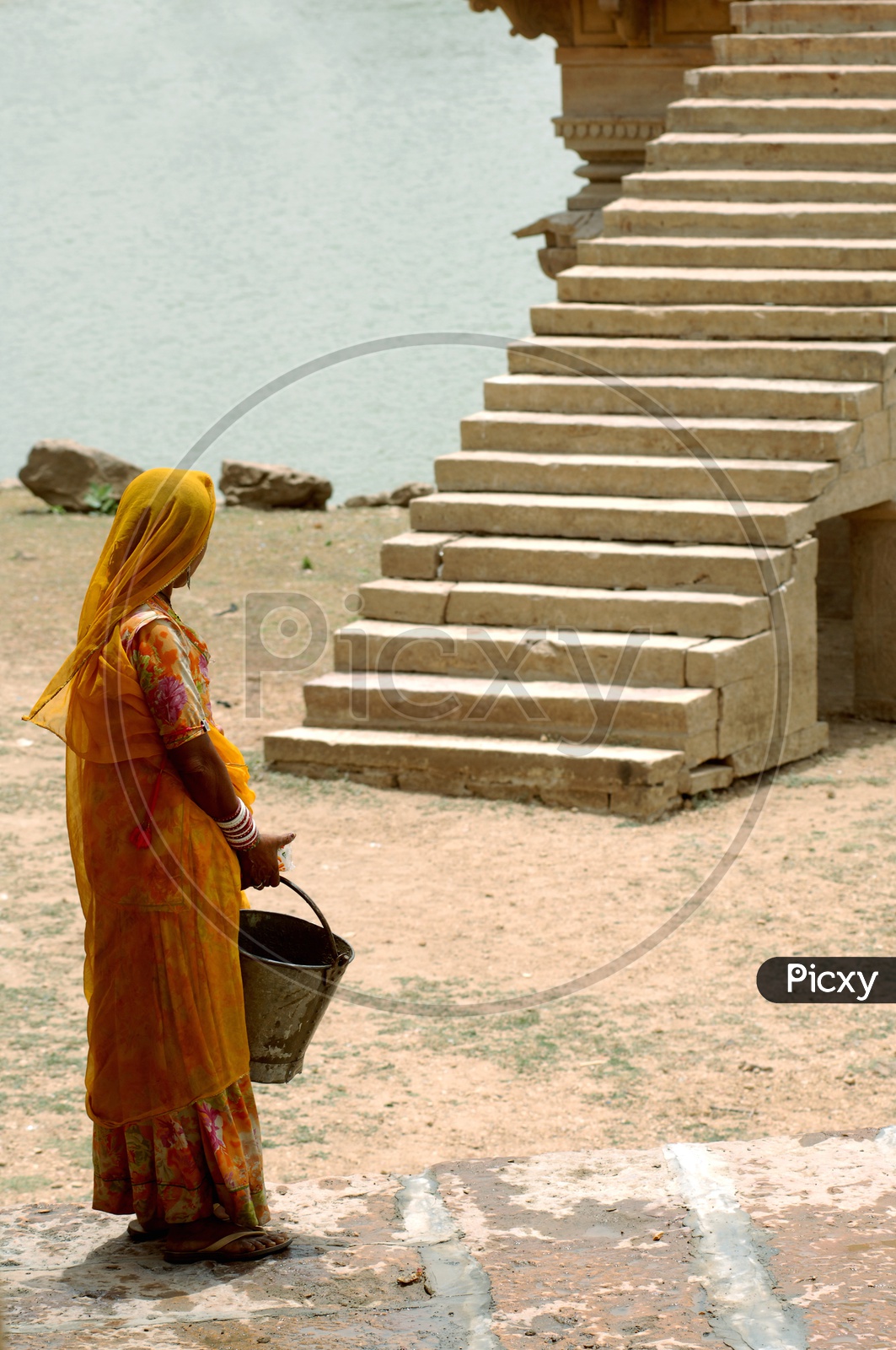 Rajasthani woman carrying a bucket