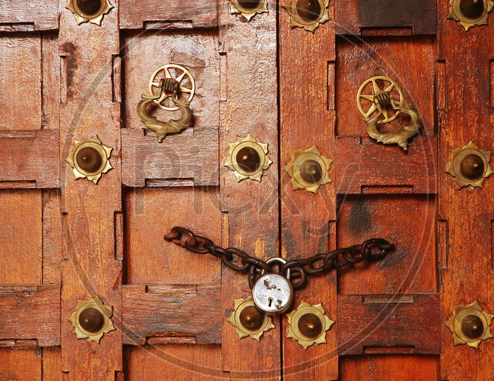 Locked wooden door of a temple