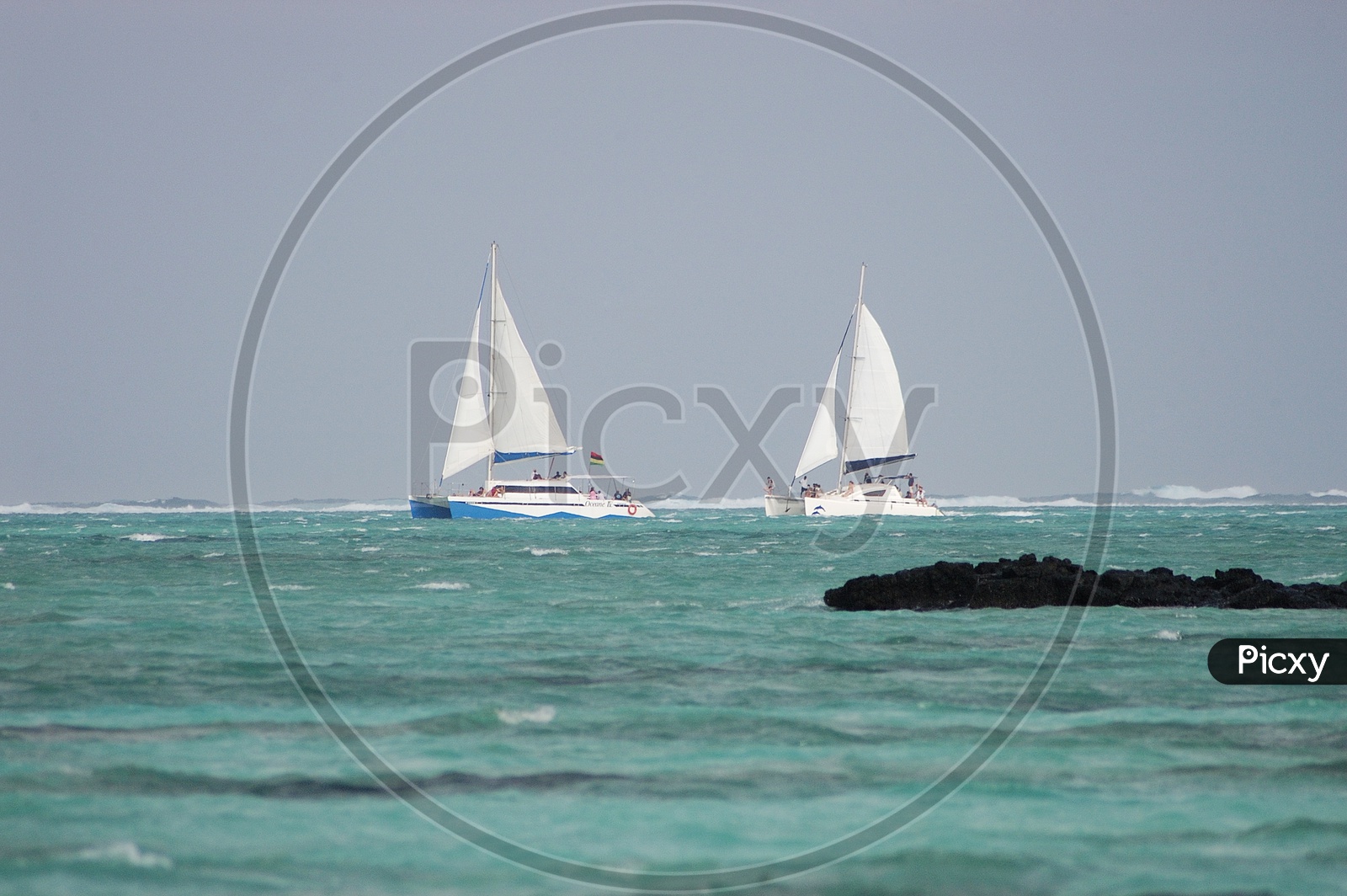 Sailing boats at the beach in Mauritius