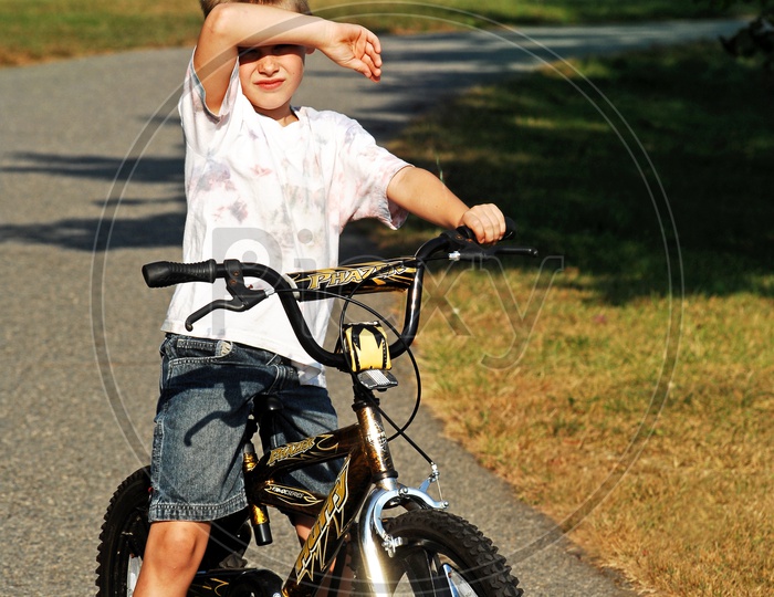 An American boy riding bicycle