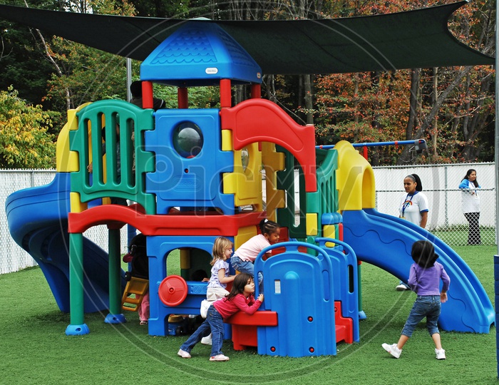Children Playing In a Amusement Parrk