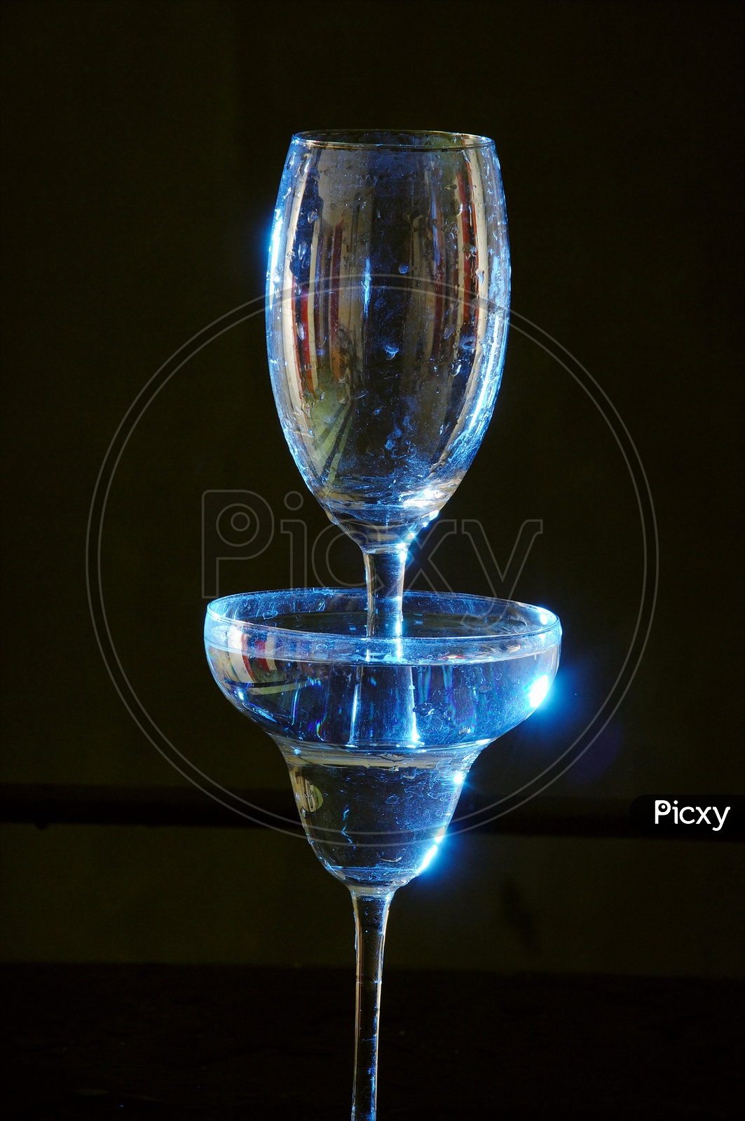 Water being poured in the wine glass