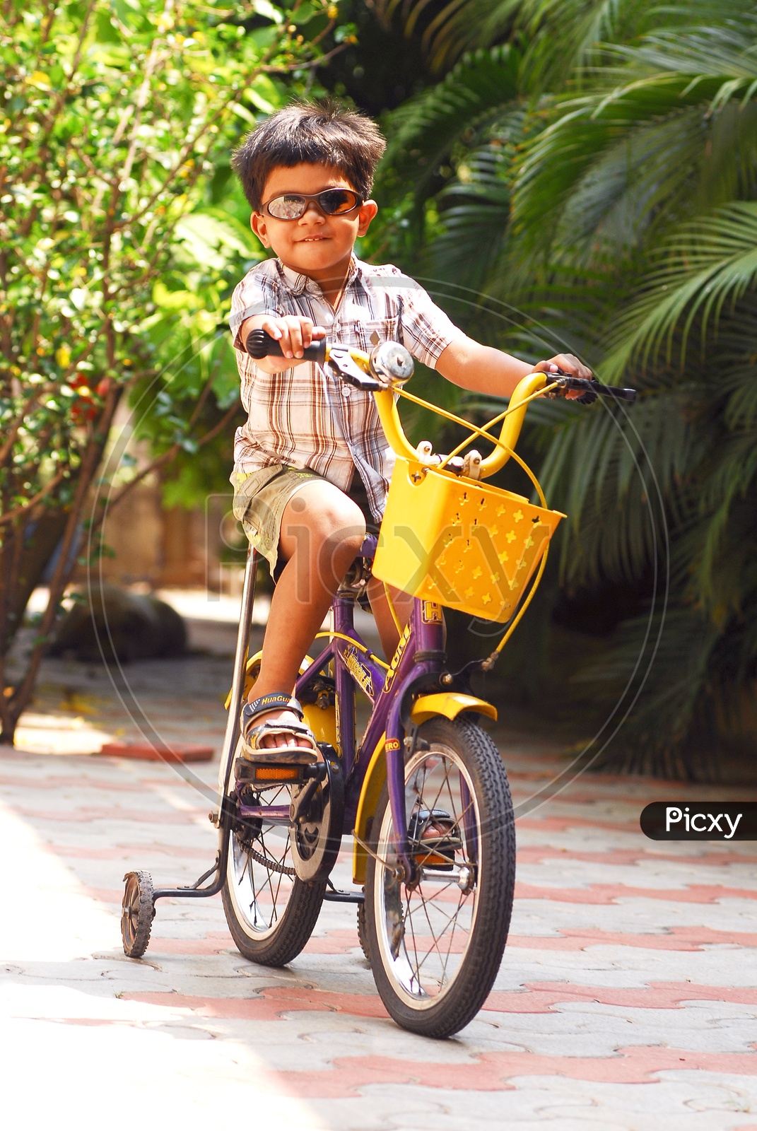 Indian kid riding bicycle
