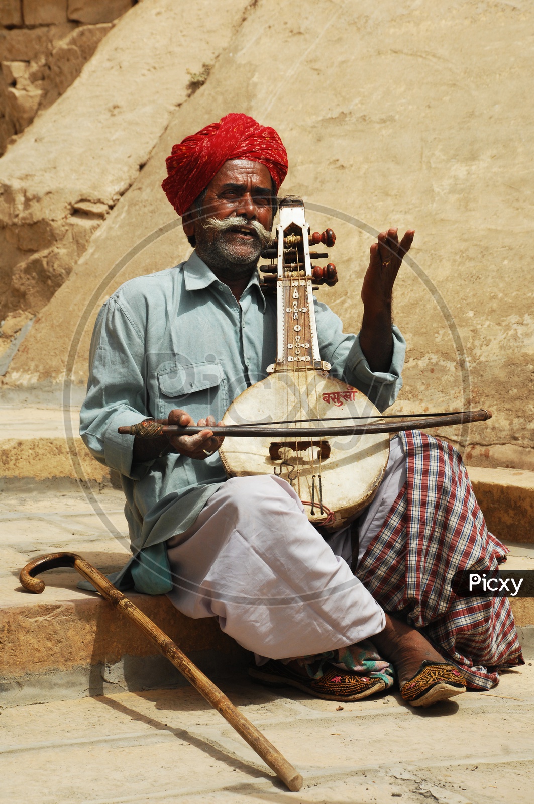 Rajasthani Men playing musical instrument