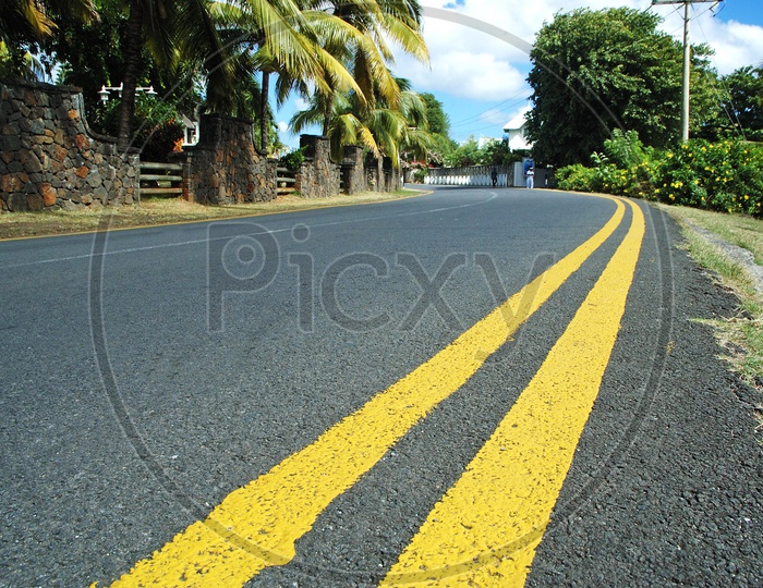 Yellow pavement marking on the road