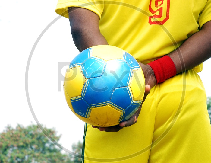Player holding the football