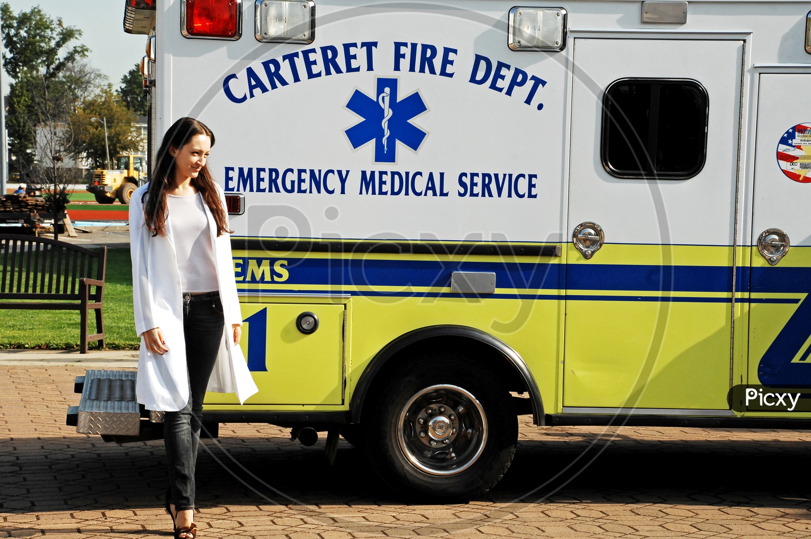 A Female Doctor beside the ambulance
