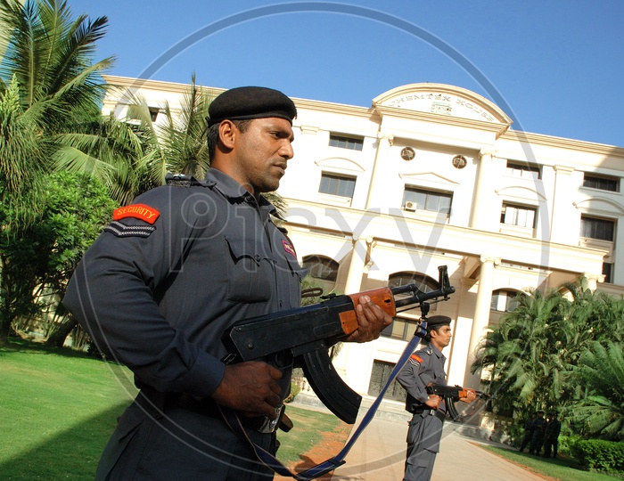 Gunmen security guard service at a building