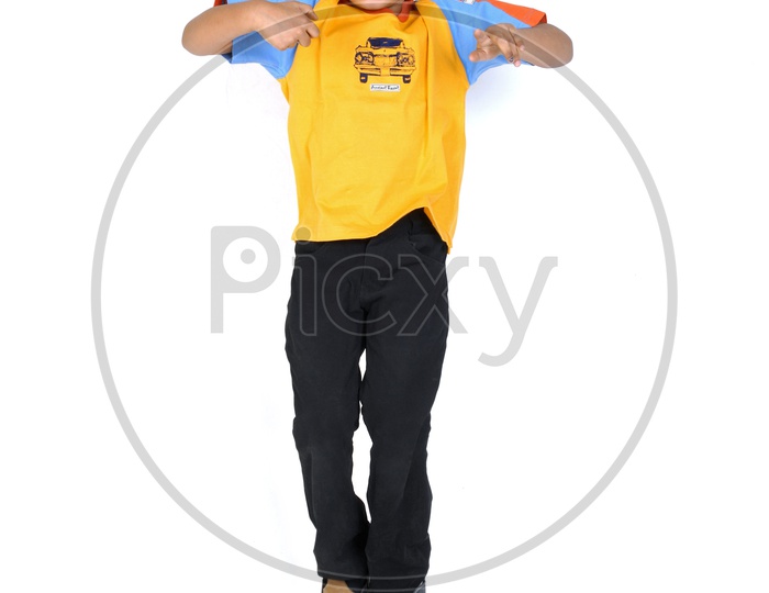 An Indian boy jumping in white background