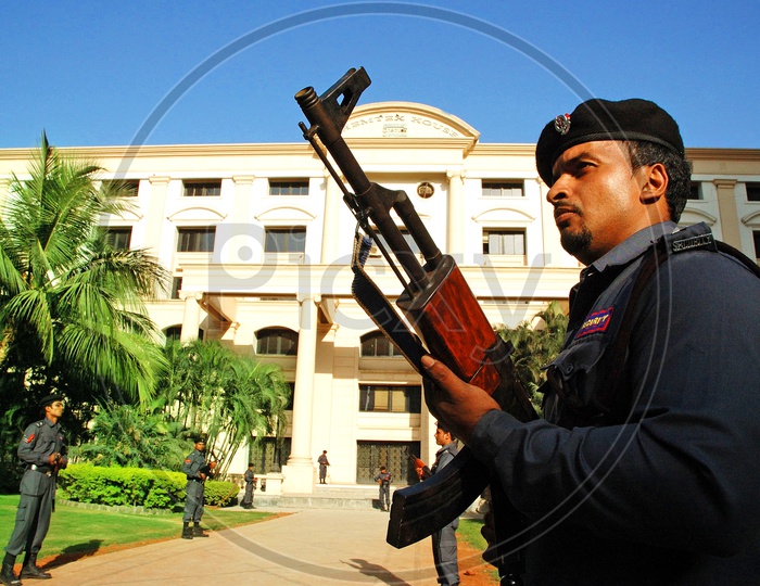 Gunmen security guard service at a building