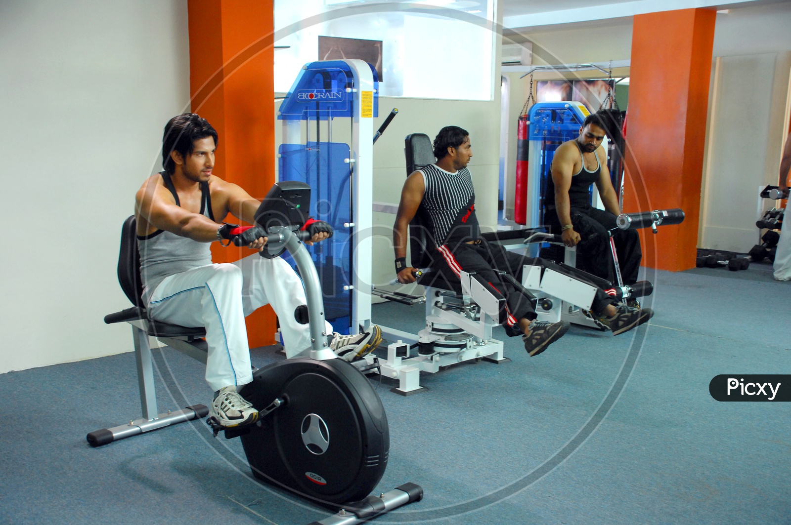 Indian men exercising in the gym