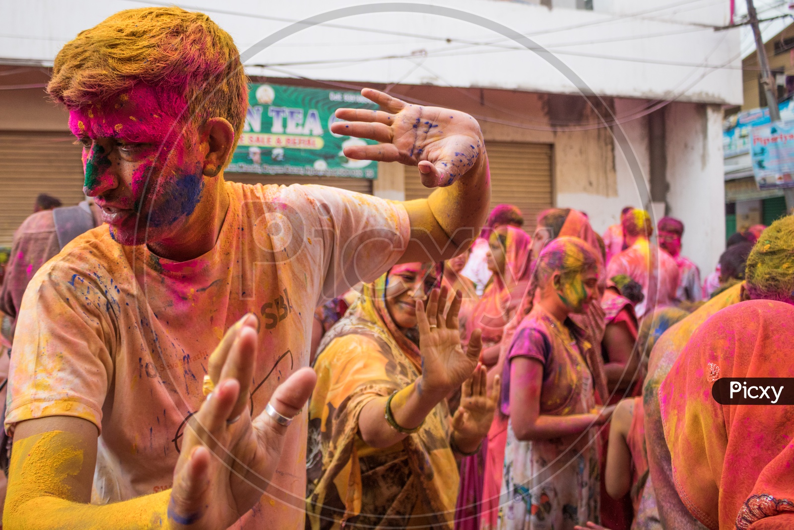 people dancing on the day of holi