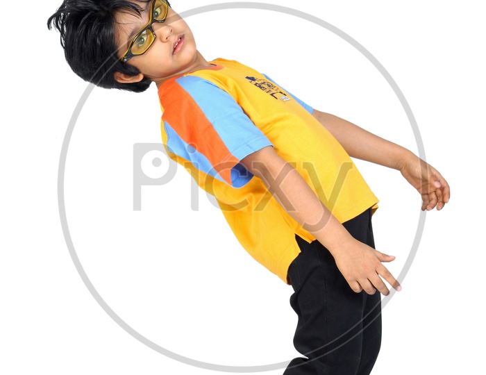 An Indian boy with specs dancing in white background