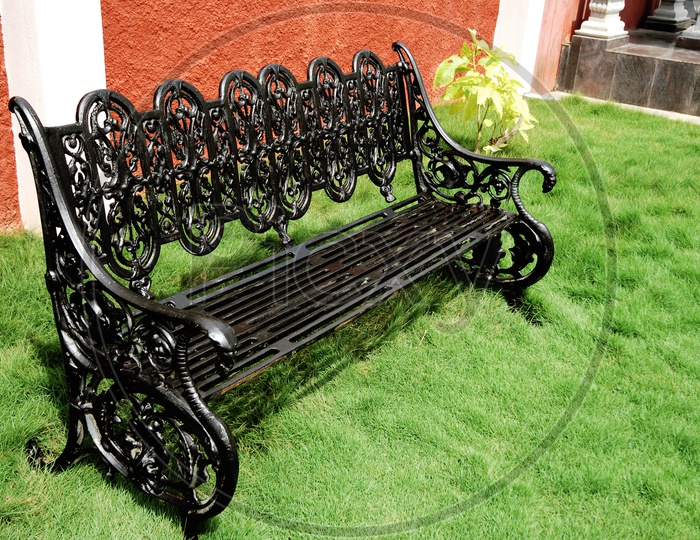 Iron bench on the lawn
