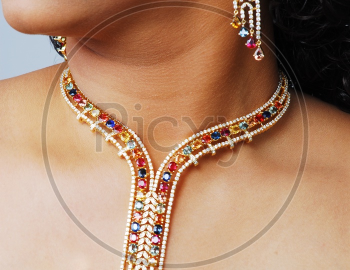 Close up shot of necklace on women's neck
