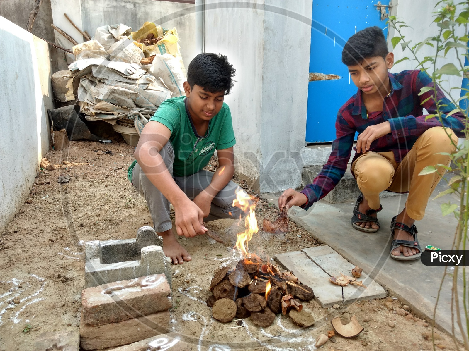 Children doing their rituals on the day of Bhogi festival