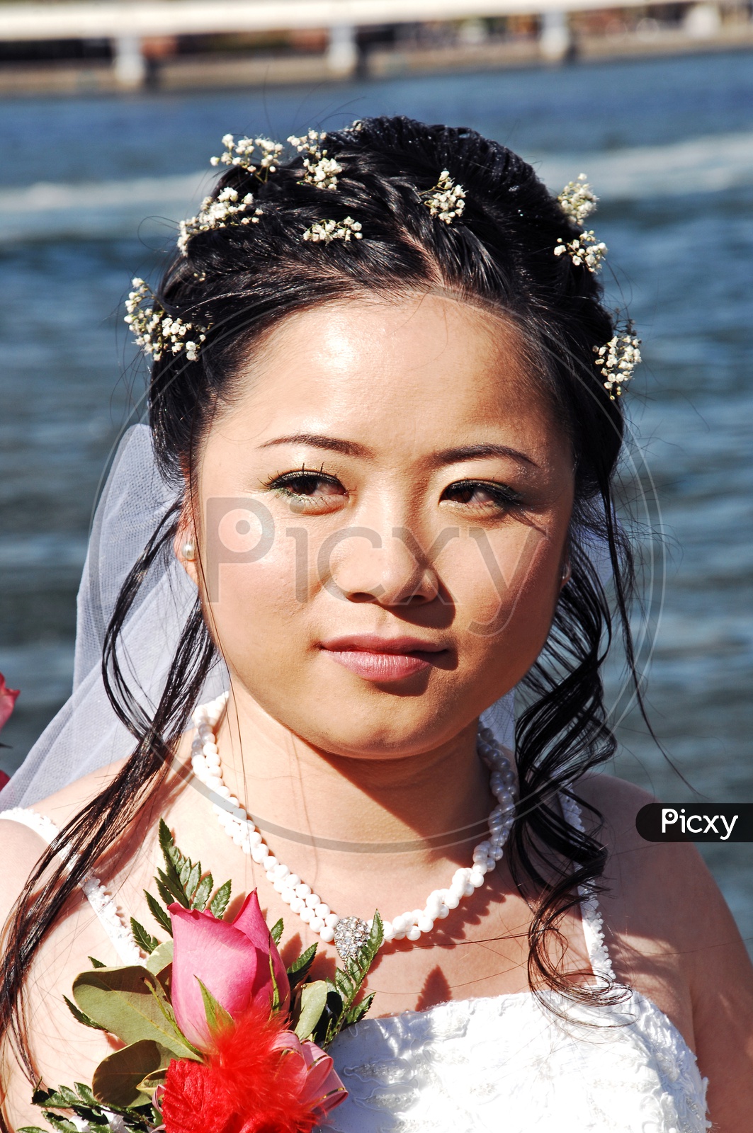 A woman wearing bridal costume