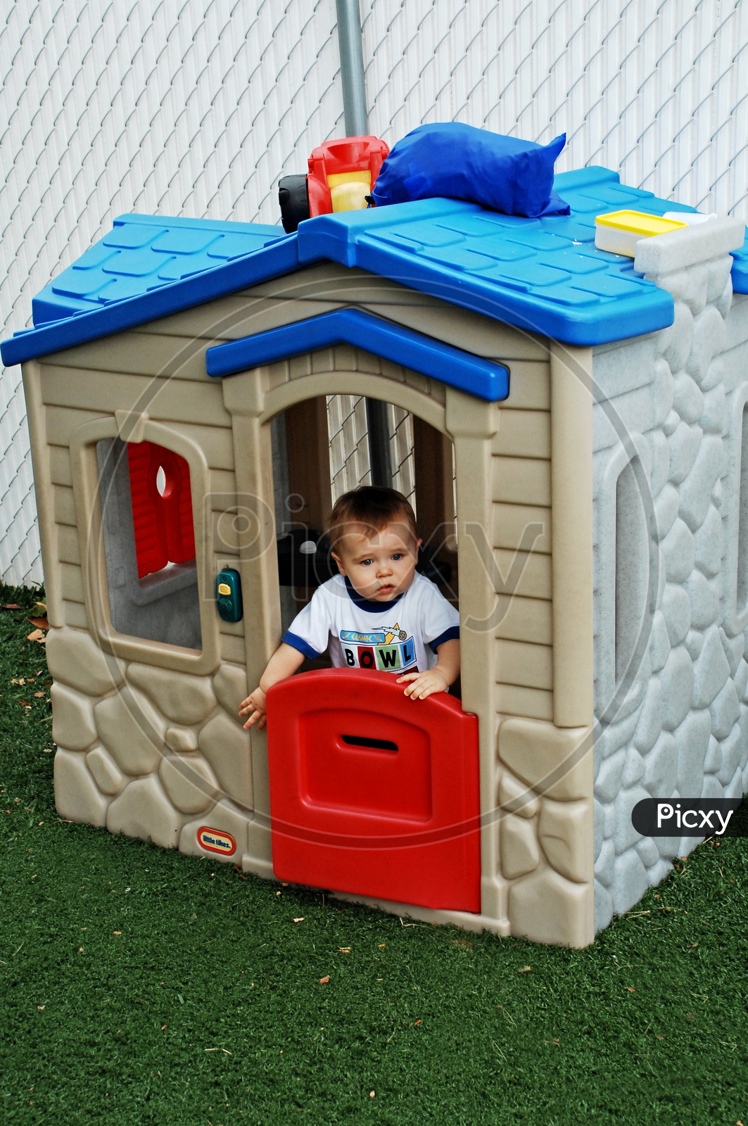 Toddler playing in the play area