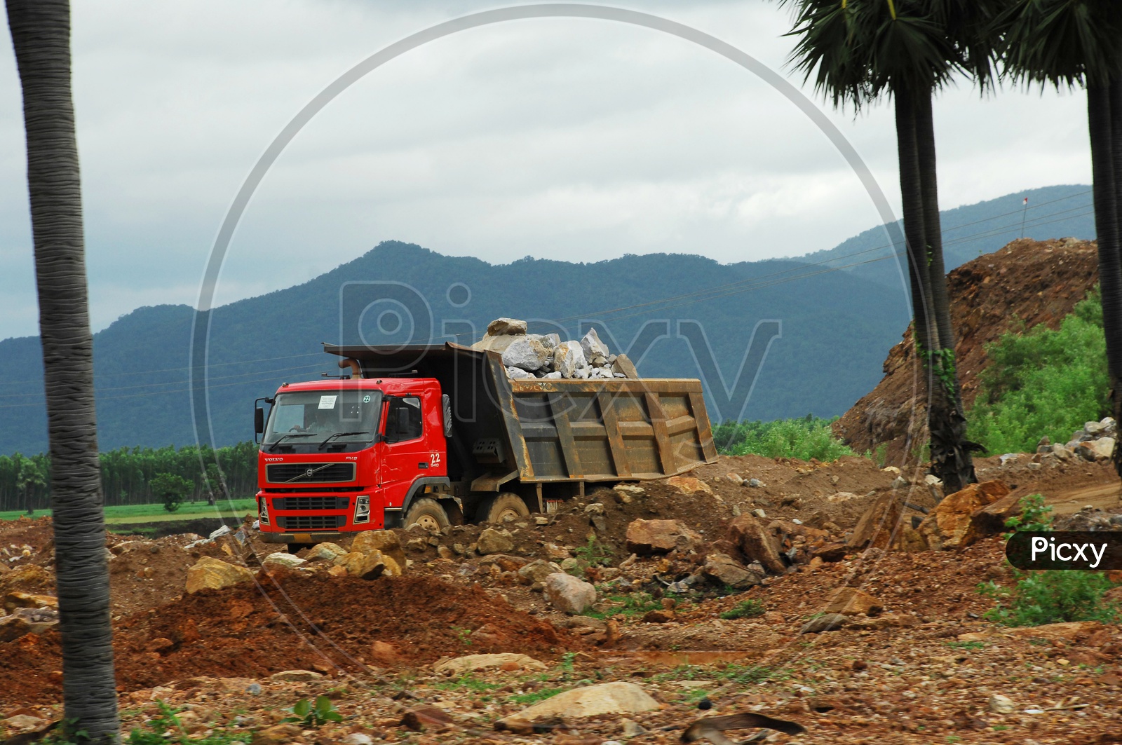 Heavy truck carrying a load of rocks