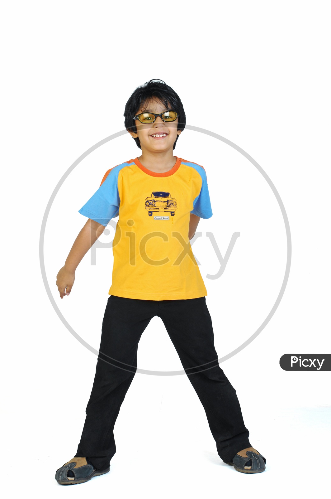 An Indian boy dancing in white background