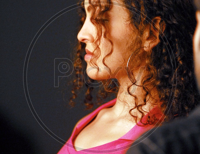 Indian woman with curly hair