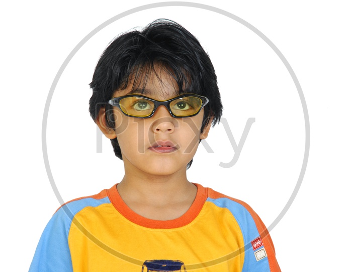 An Indian boy with specs in white background