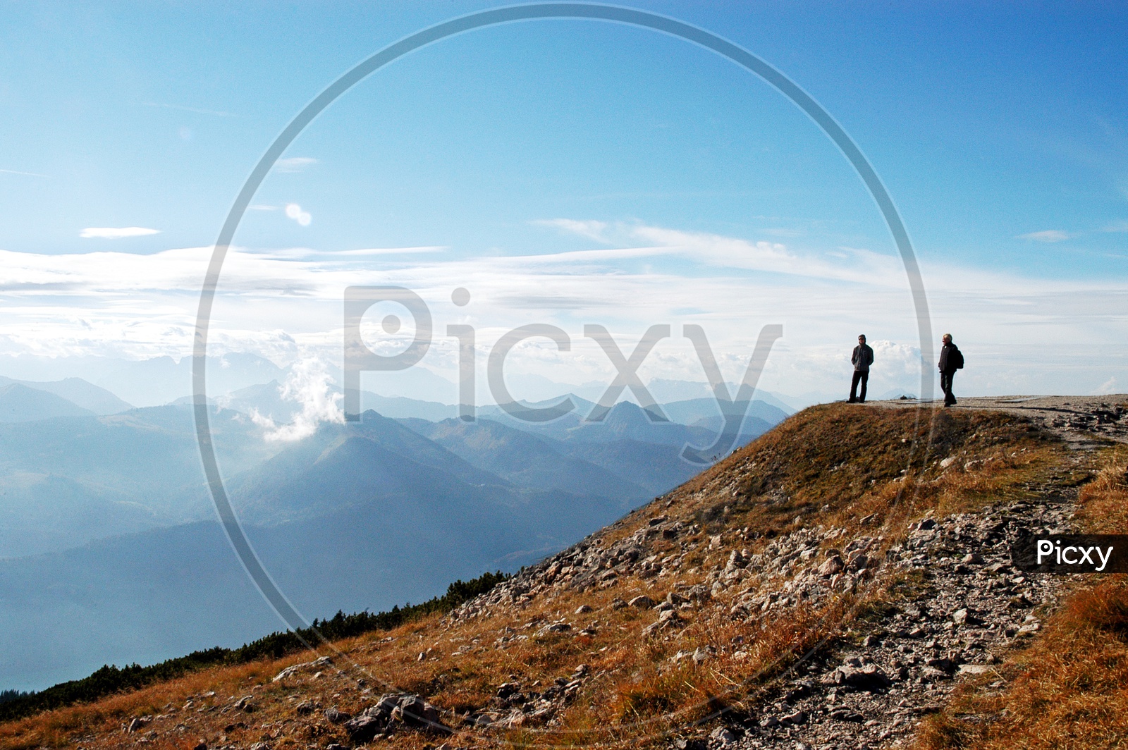 Two Men  standing on top of the Hoher Dachstein Mountain