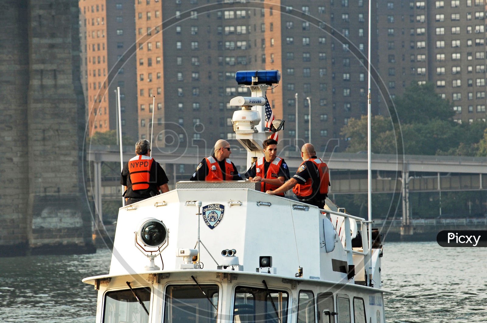 Police men in the patrol ship