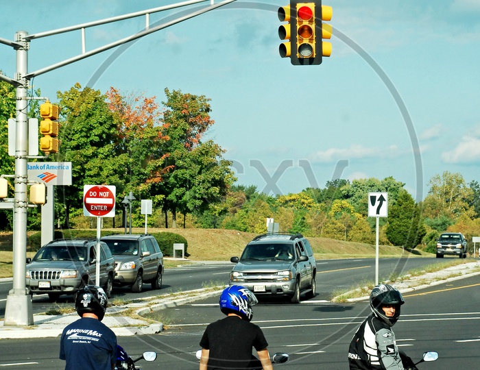 Motorcycle Riders at Red Signal