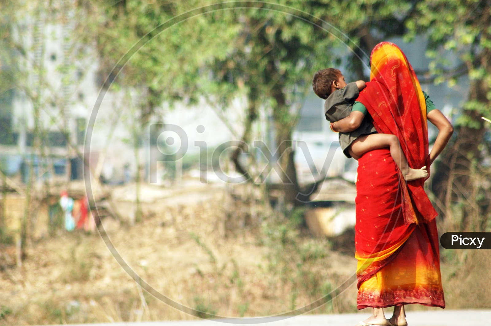 Indian Mother carrying his child