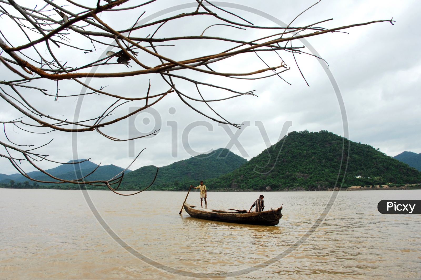 Rural kids sailing the boat on River Godavari