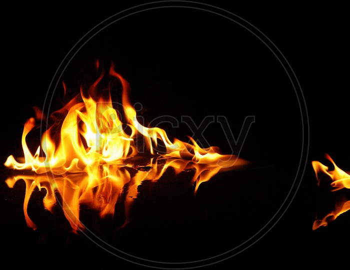 Fire, Flames and its reflections with black background